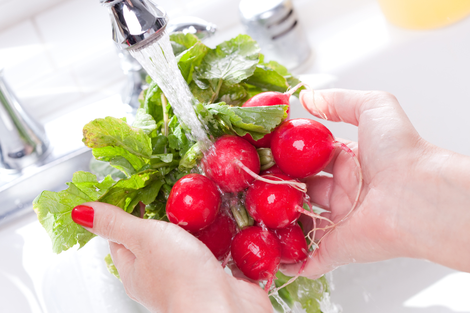 saving water at home - washing vegetables